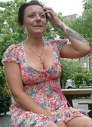 Mature slut masturbating in the street
